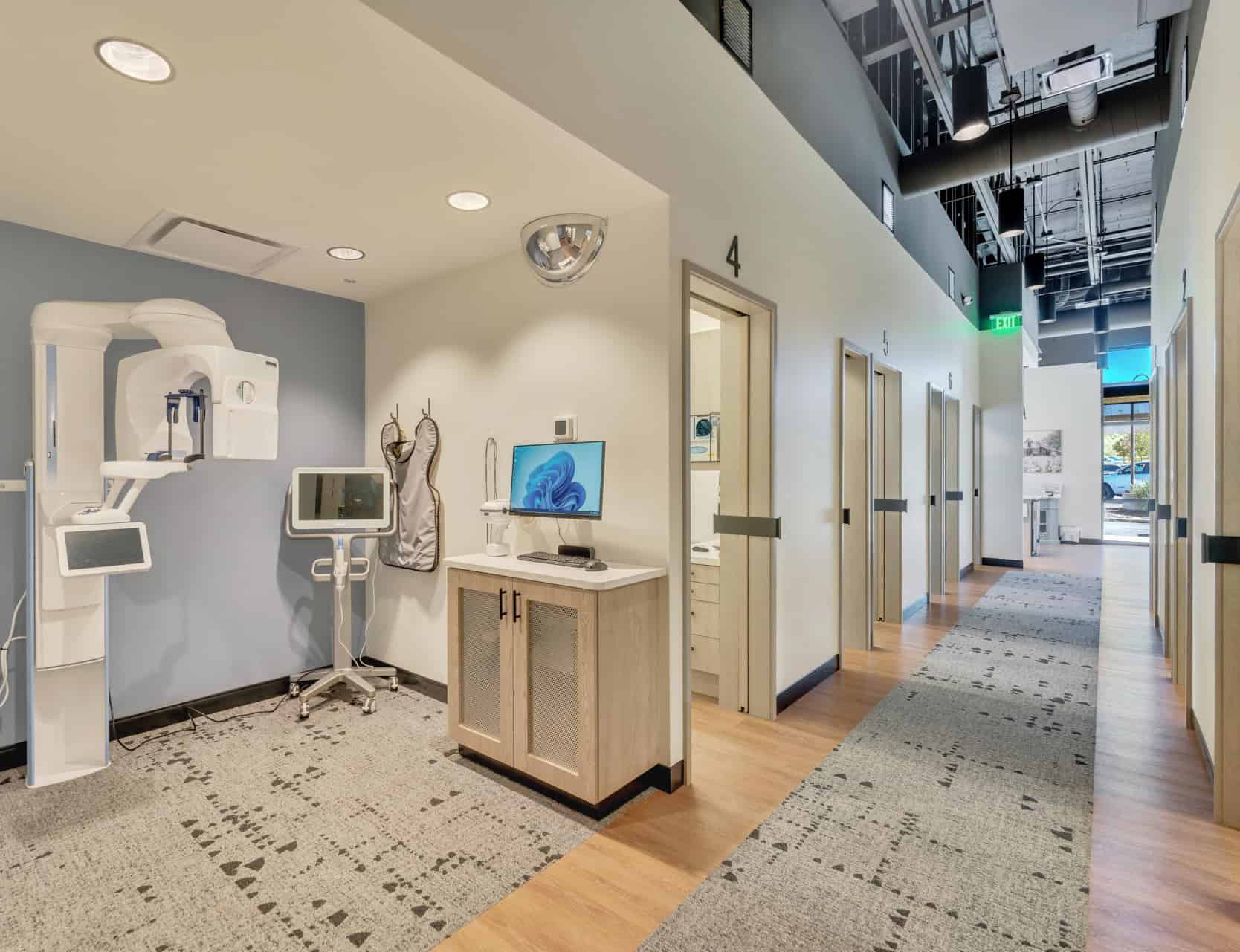 Our 3D x-ray scanner and several of our treatment rooms inside the Signature Dentistry Centennial office